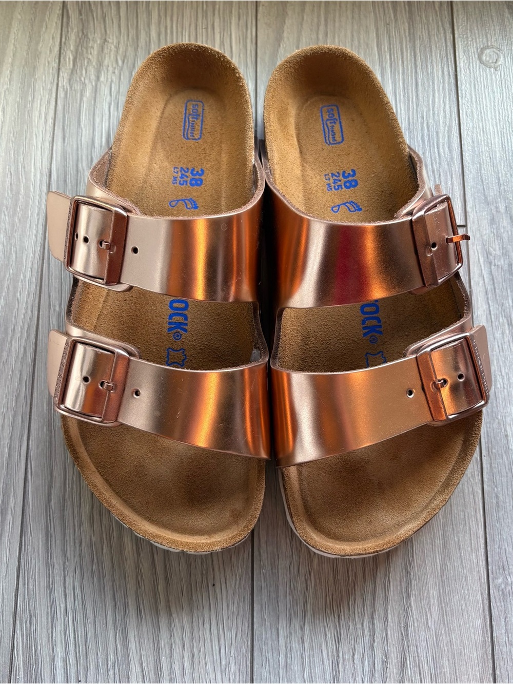 Rose gold Birkenstock Arizona sandals
